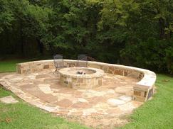 fire pit and stone bench