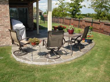 A natural flag stone patio can transform any yard into beautiful, outdoor living space.